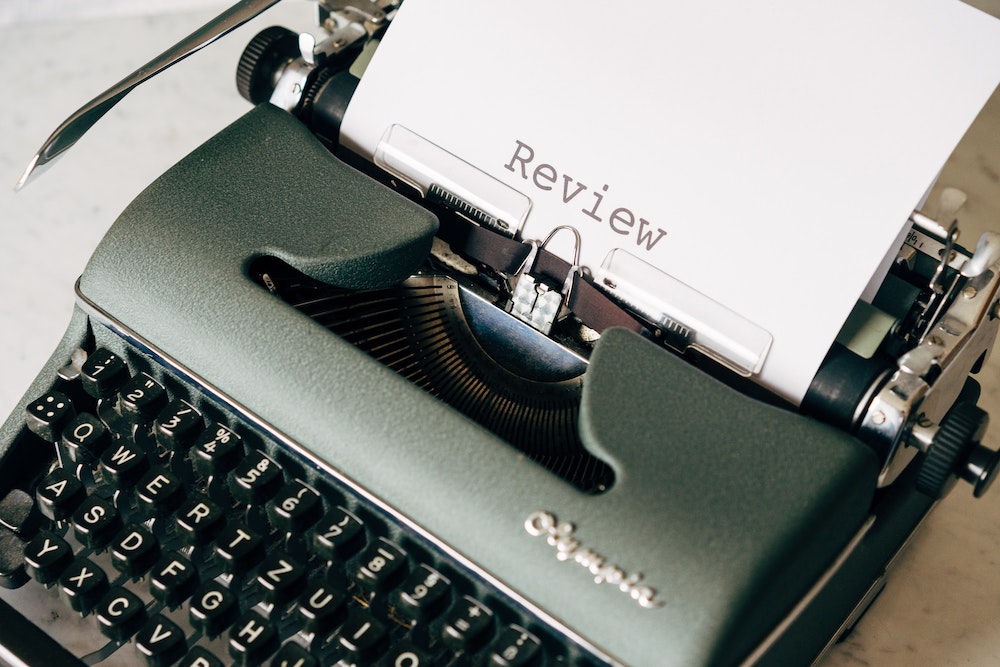 Typewriter with the word review